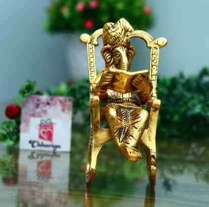 Golden Lord Ganesha Statue Sitting On A Rocking Chair And Reading Ramayan Showpiece - Harappakart